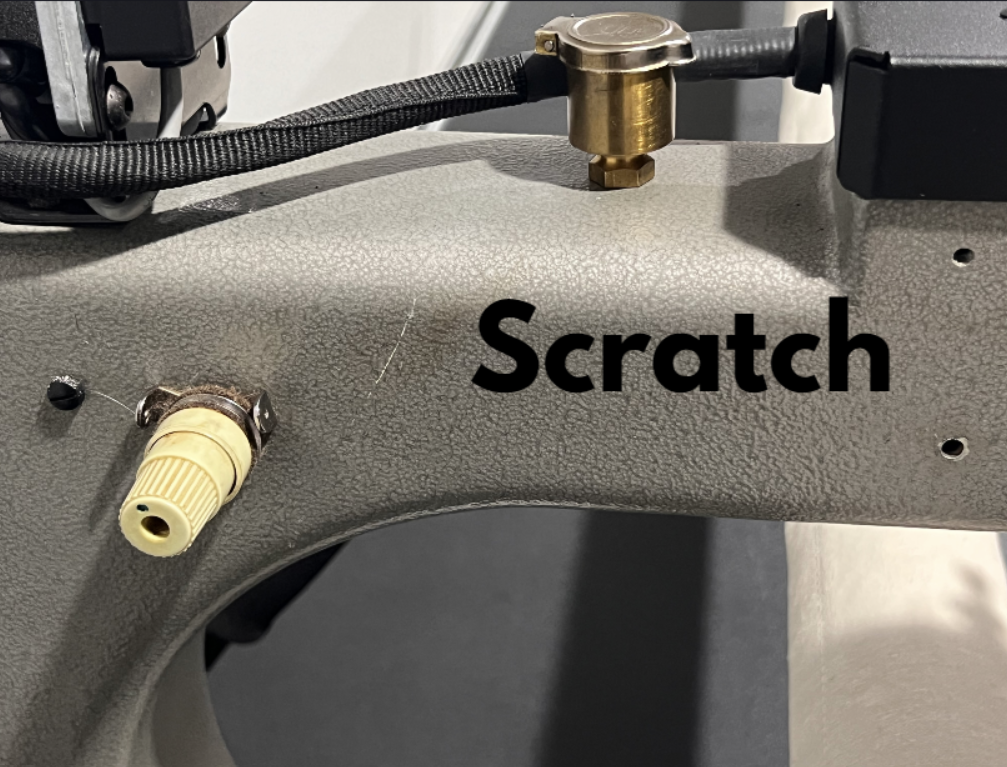 Example of a cosmetic scratch on a pre-loved Gammill machine